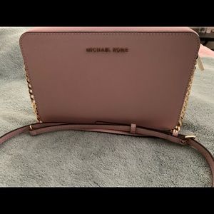 Michael Kors pink crossover handbag and wallet